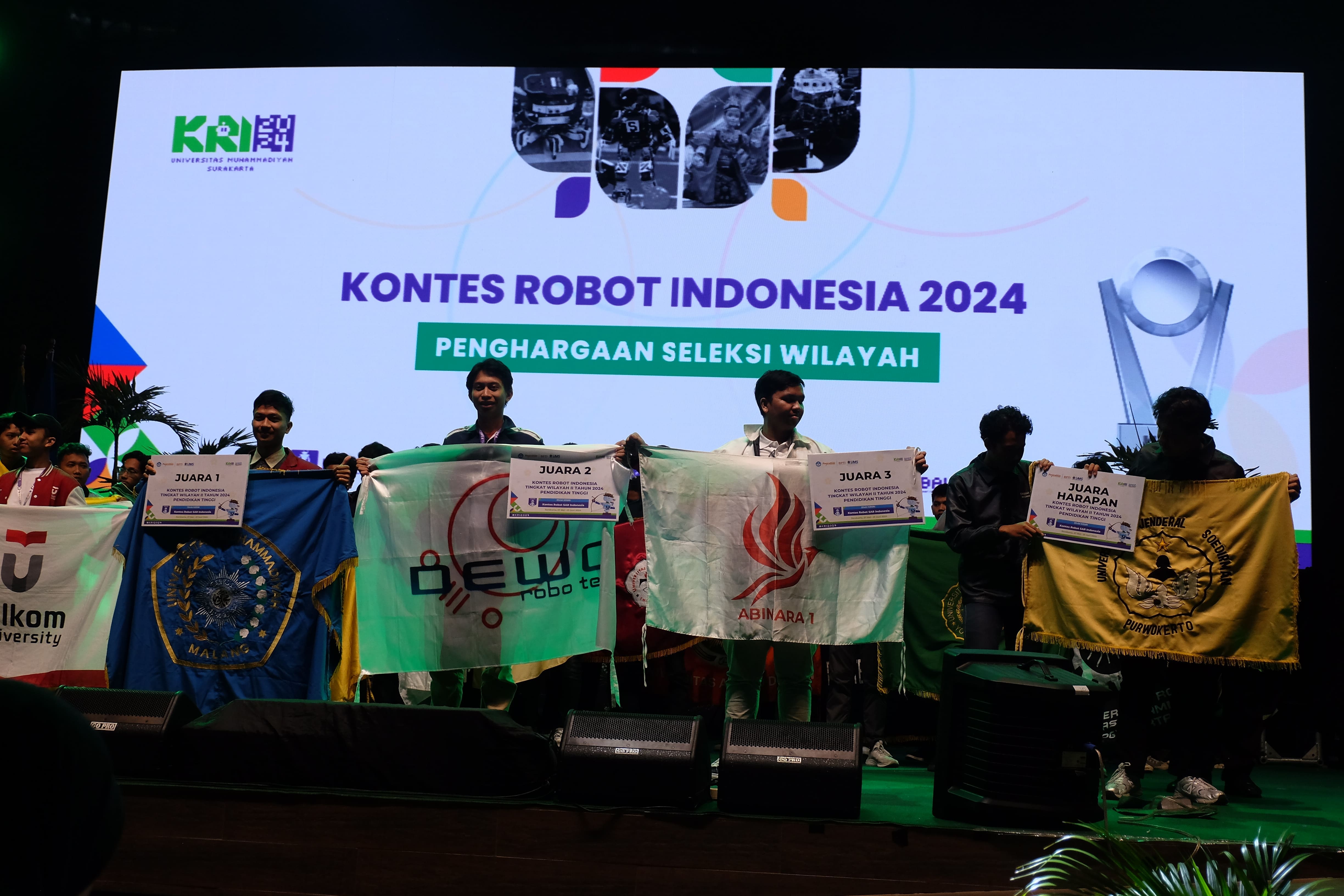 Robotics teams receiving awards at Kontes Robot Indonesia 2024